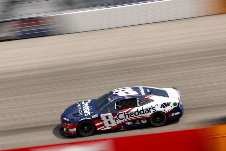 Kyle Busch drives at Dover.