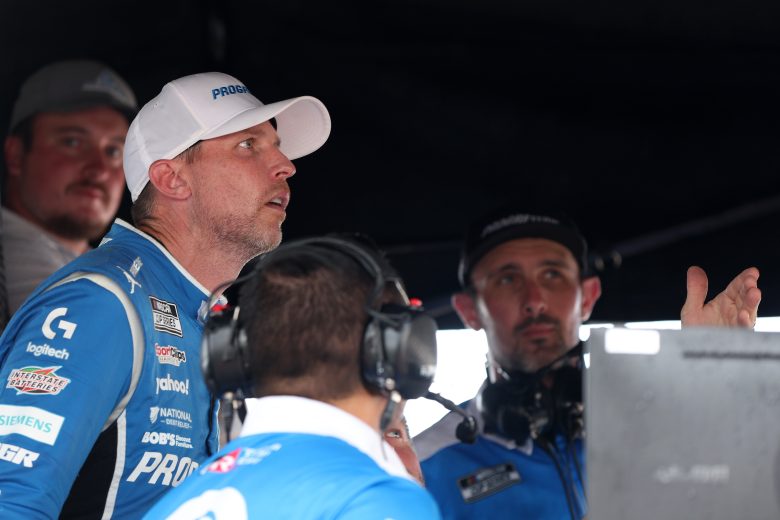 Denny Hamlin looks on in his pit box.