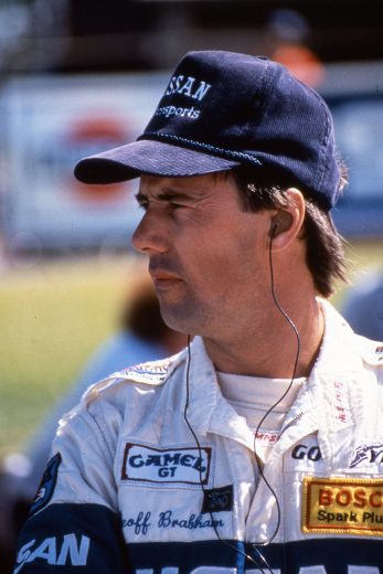 Geoff Brabham looks on