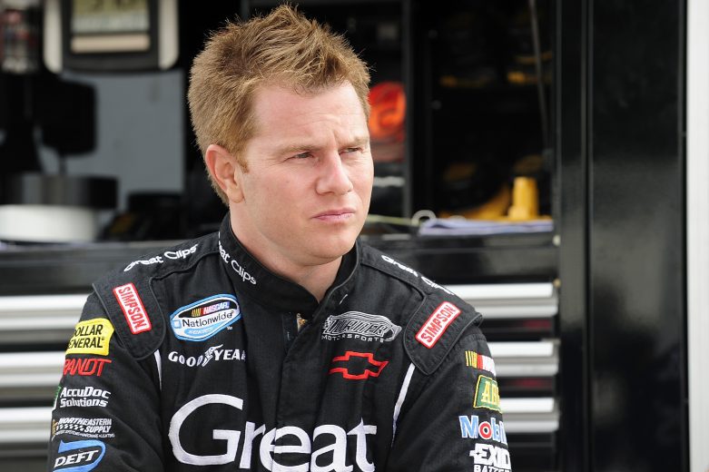 Jason Leffler looks on from pit road.