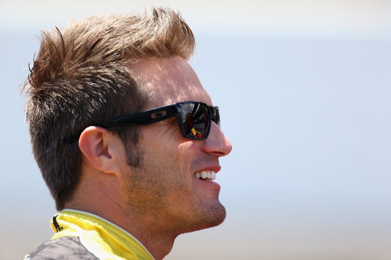 JJ Yeley looks on.