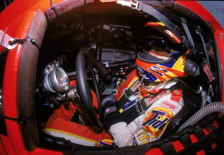 Scott Pruett sits in his NASCAR Cup Car.