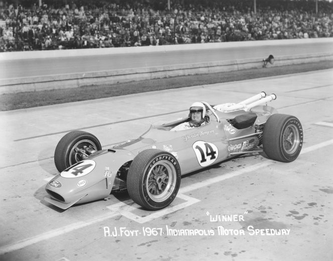 AJ Foyt smiles from the seat of his IndyCar after winning the Indy 500 in 1967.