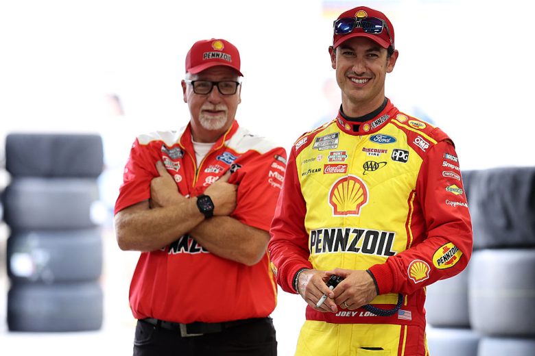 Joey Logano looks on at Indianapolis.