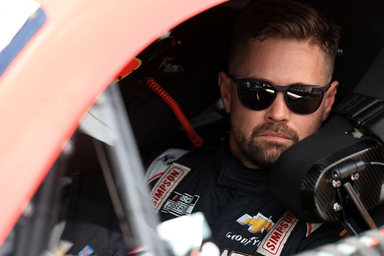 Ricky Stenhouse Jr. sits in his car at Indianapolis.