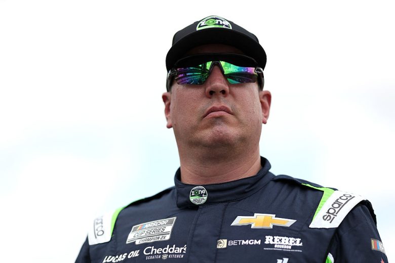 Kyle Busch looks on at Indianapolis.