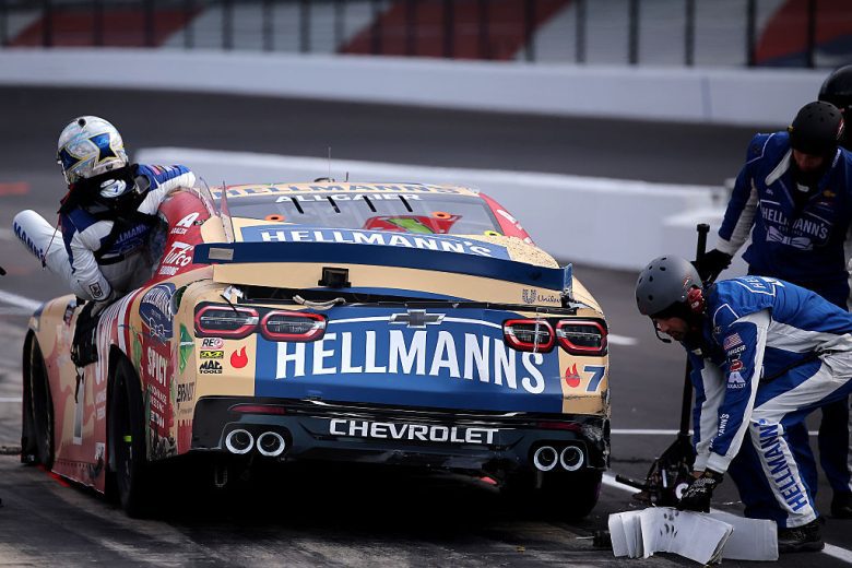 Justin Allgaier exits his car at Indianapolis.