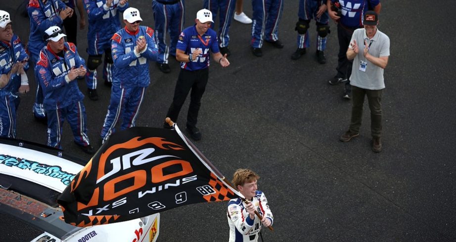 Connor Zilisch celebrates in Victory Lane at Indianapolis.