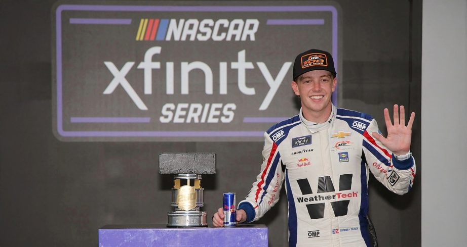Connor Zilisch celebrates in Victory Lane at Indianapolis.