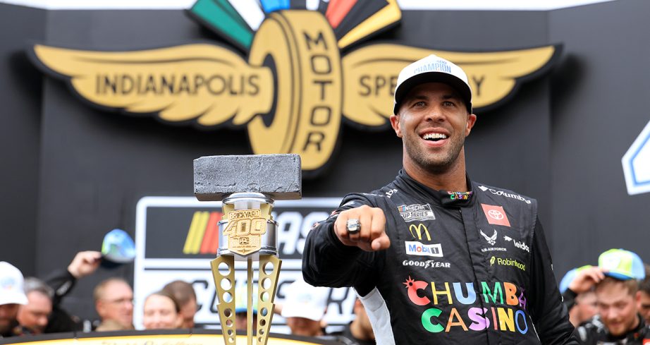 bubba wallace celebrates his brickyard 400 win