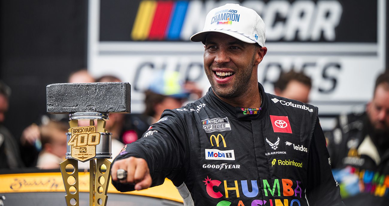 Bubba Wallace shows off his Brickyard 400 ring in Victory Lane.