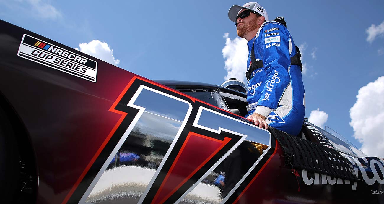 Chris Buescher looks on as he loads into the No. 17 Ford at Indianapolis Motor Speedway