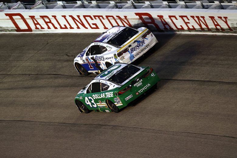 Ross Chastain, in the No. 1 Trackhouse Racing Chevrolet, races ahead of Erik Jones in the No. 43 Legacy Motor Club Toyota at Darlington Raceway.