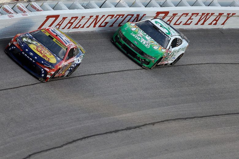 Chase Briscoe, in the No. 19 Joe Gibbs Racing Toyota, races ahead of Erik Jones in the No. 43 Legacy Motor Club Toyota.