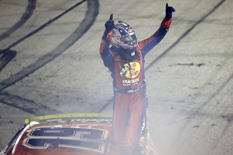 Chase Briscoe points to the crowd in celebration at Darlington Raceway.
