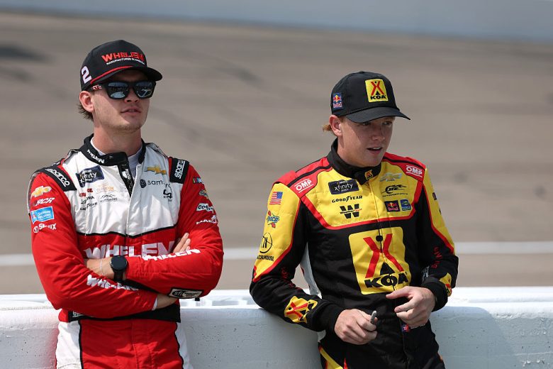 Jesse Love and Connor Zilisch look on at Iowa.
