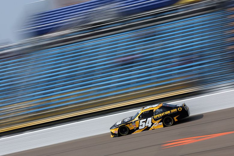 Taylor Gray drives at Iowa.