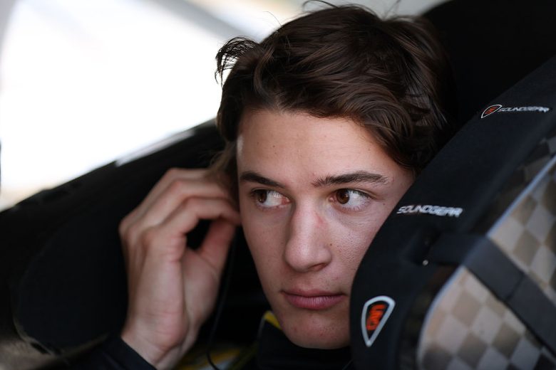 William Sawalich sits in his car at Iowa.