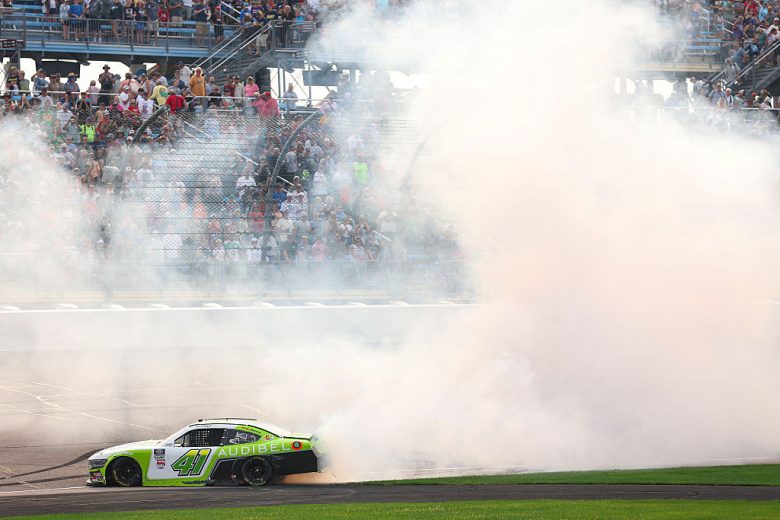 Sam Mayer celebrates with a burnout at Iowa.