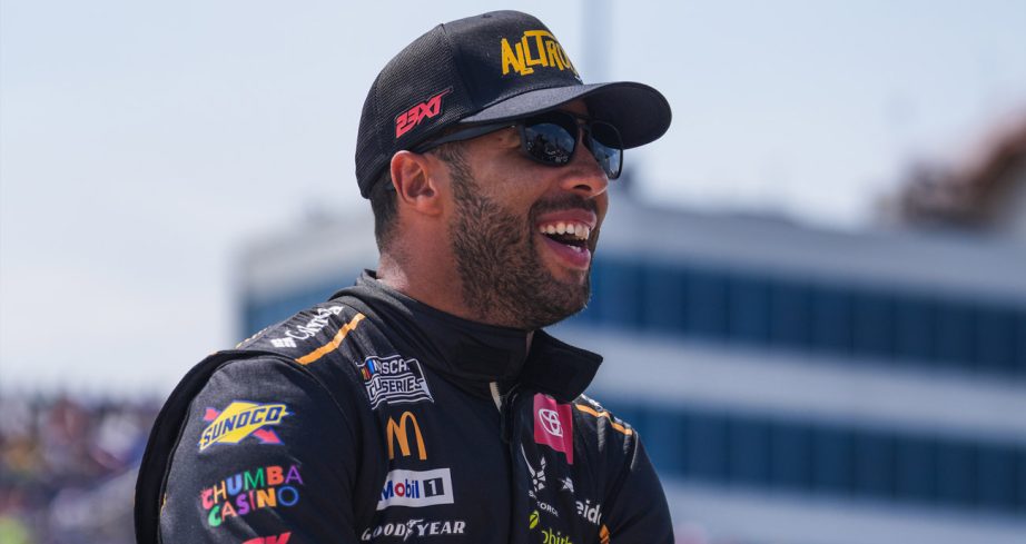 Bubba Wallace shares a laugh before a NASCAR Cup Series race at Iowa.