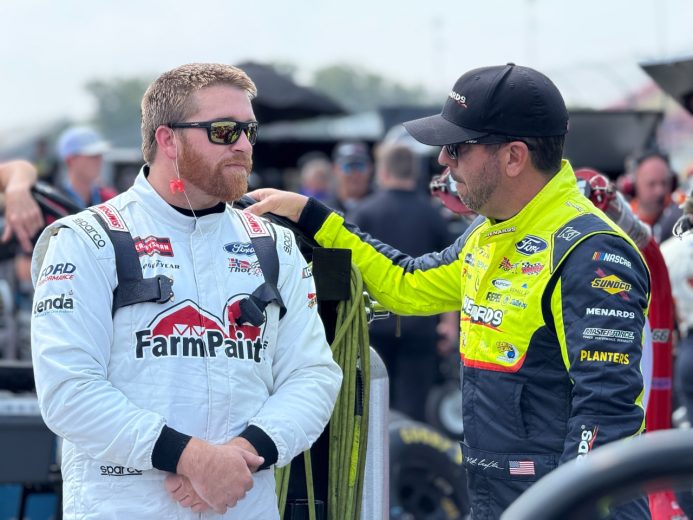 Chris Buescher (L) talks with Matt Crafton (R) at Watkins Glen International.