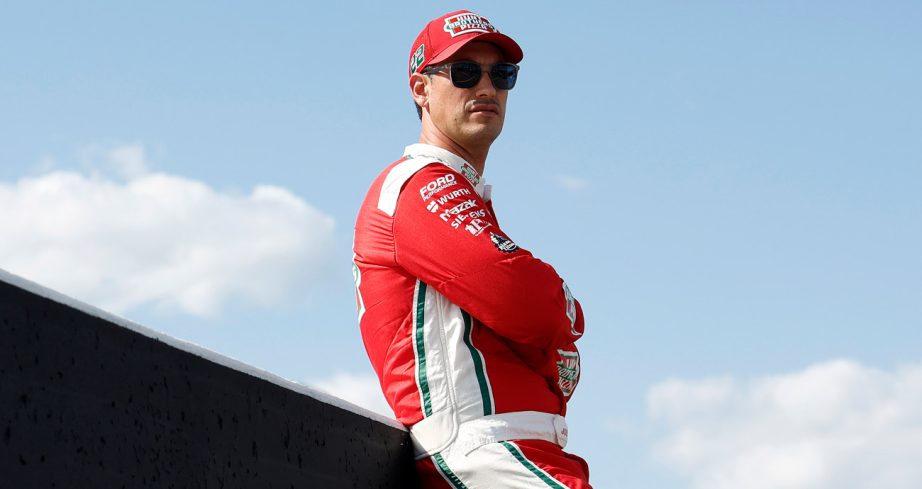 Joey Logano looks on at Gateway.