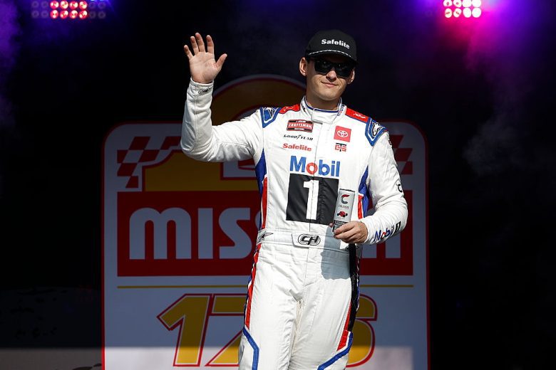 Corey Heim waves to the crowd before a NASCAR Craftsman Truck Series race at Watkins Glen International.