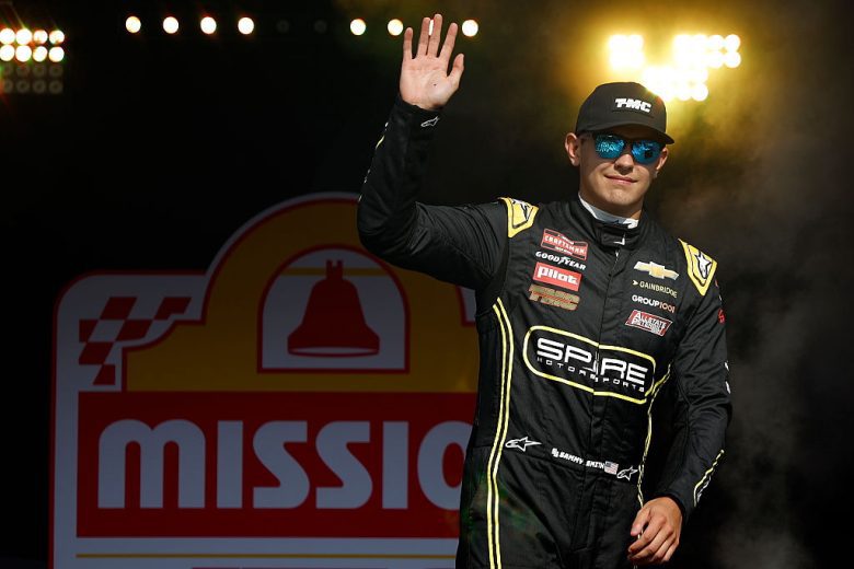 Sammy Smith waves to the crowd before a NASCAR Craftsman Truck Series race at Watkins Glen International.