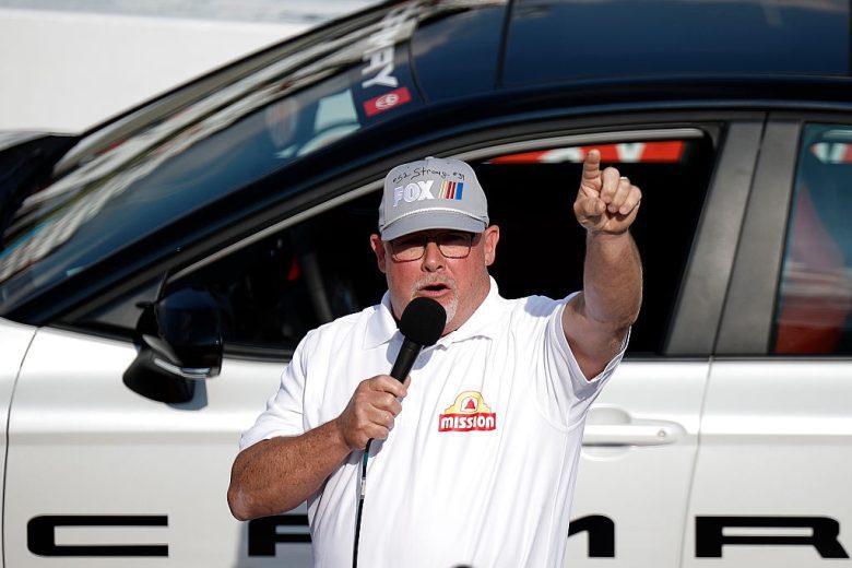 Todd Bodine gives the command before the NASCAR Craftsman Truck Series race at Watkins Glen International.
