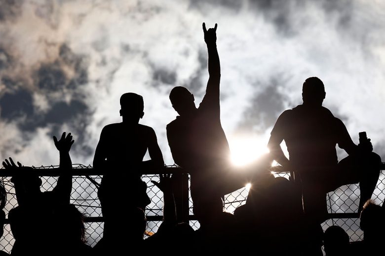 Fans cheer during a NASCAR Craftsman Truck Series race at Watkins Glen International.