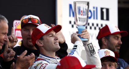 Corey Heim celebrates at Watkins Glen International following his NASCAR Craftsman Truck Series win at the New York road course.