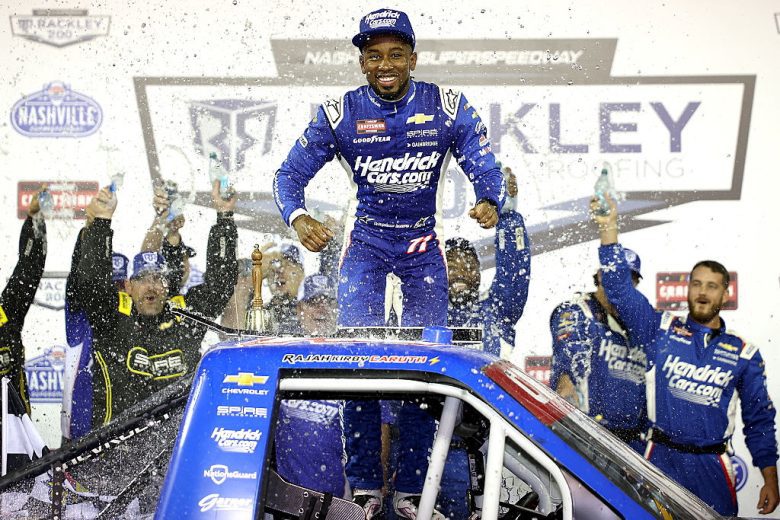 Rajah Caruth celebrates in Victory Lane following his NASCAR Craftsman Truck Series win at Nashville Superspeedway.