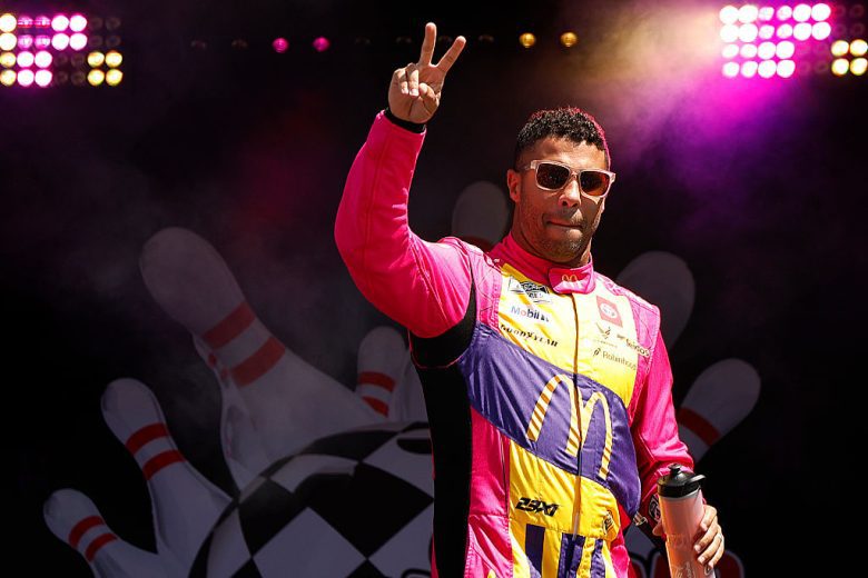 Bubba Wallace waves to fans.