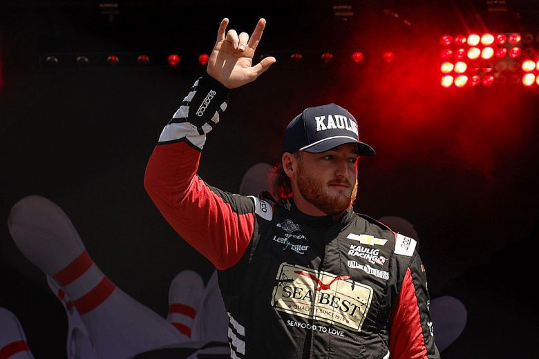 Ty Dillon waves to fans.