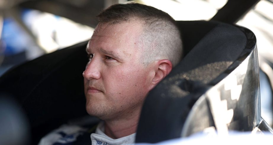 Ryan Preece sits in his car at Richmond.