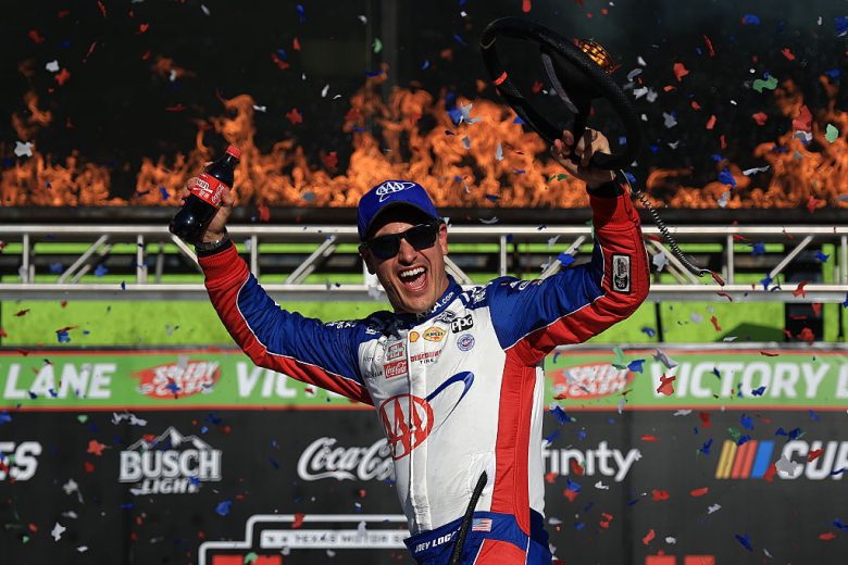 Joey Logano celebrates in Victory Lane.