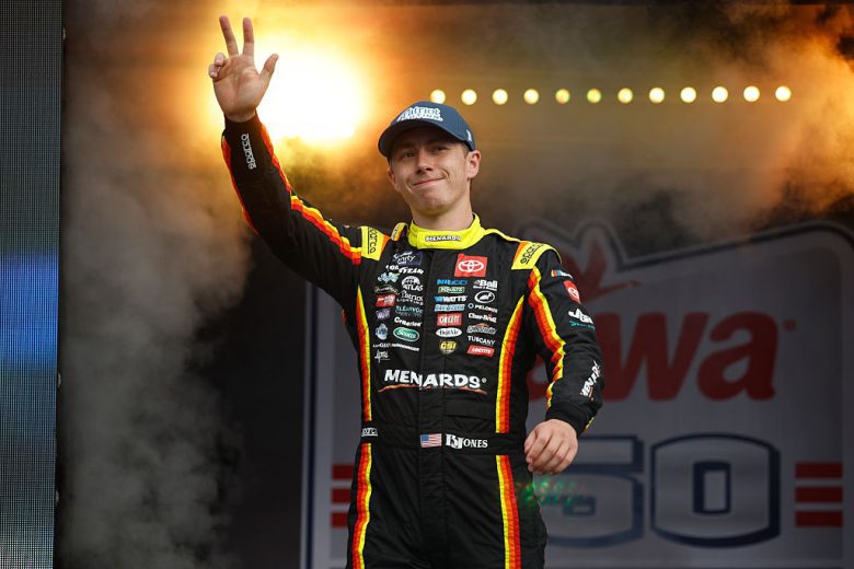 Brandon Jones waves to fans at Daytona.