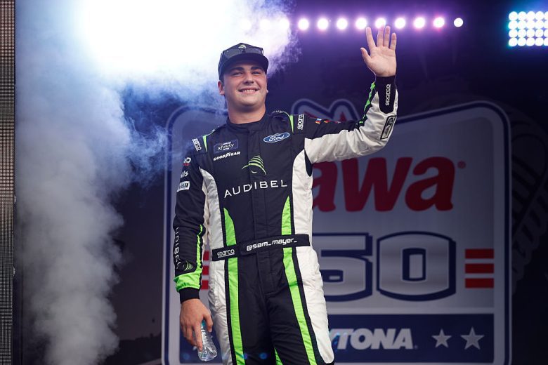 Sam Mayer waves to fans at Daytona.