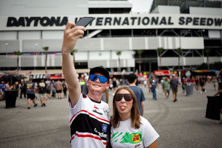 Fans pose for a photo at Daytona.