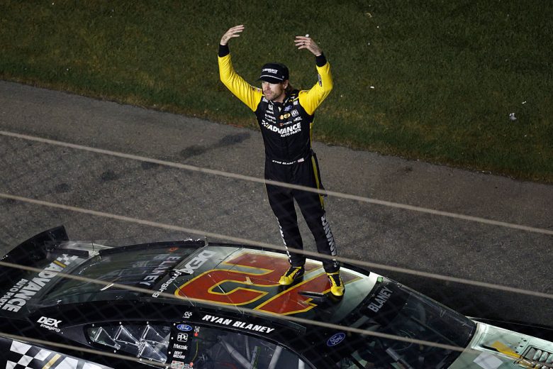 Ryan Blaney stands on top of his car at Daytona.