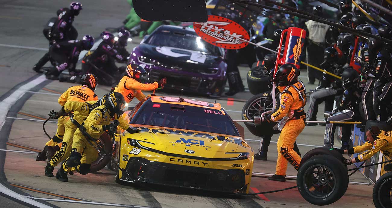 Christopher Bell pits the No. 20 Toyota ahead of the No. 48 Chevy of Alex Bowman at Richmond Raceway