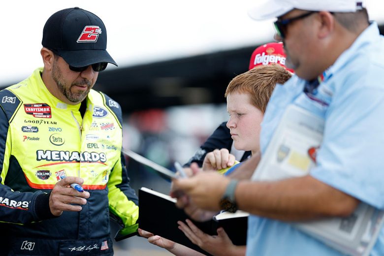 Matt Crafton signs autographs at Darlington.