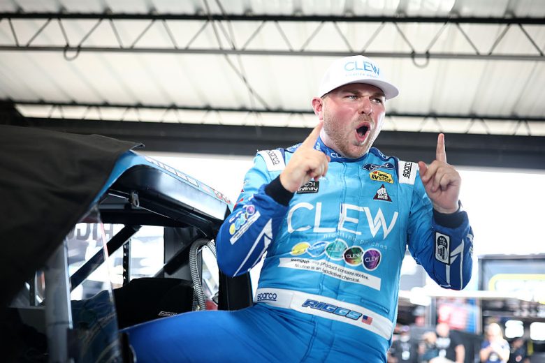 Layne Riggs celebrates after winning the pole at Darlington.