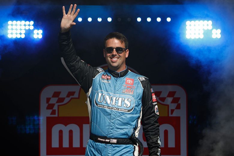 Timmy Hill waves to fans.