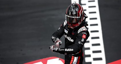 Corey Heim celebrates following his NASCAR Craftsman Truck Series victory at Darlington Raceway.