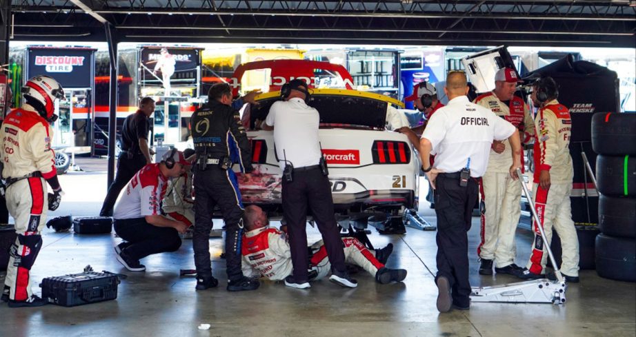 A view of Josh Berry's No. 21 Wood Brothers Racing Ford being repaired in the garage at Darlington Raceway.
