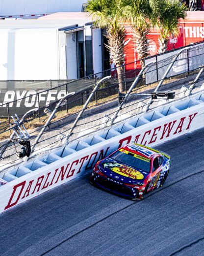 Chase Briscoe races the high line at Darlington Raceway.
