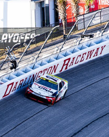 Denny Hamlin races the high line at Darlington Raceway.