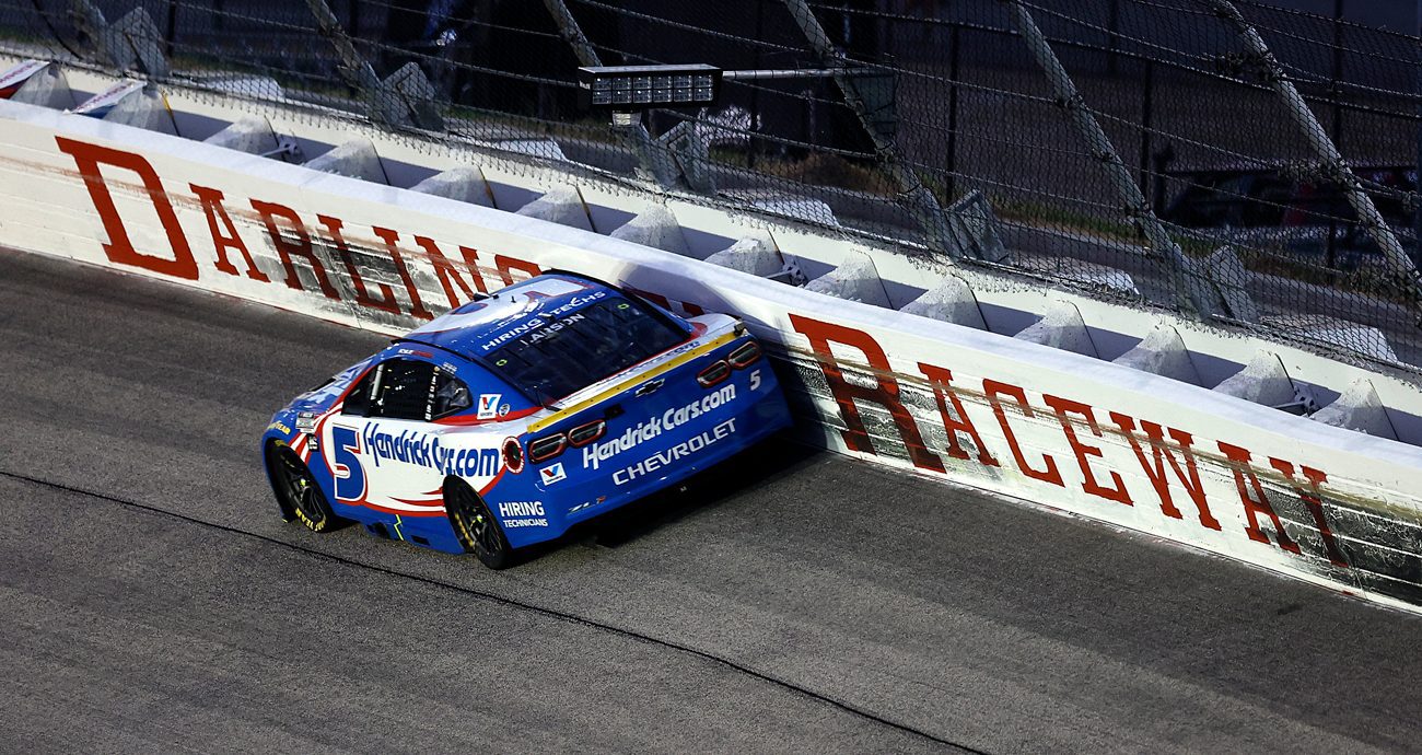 Kyle Larson drives his No. 5 Hendrick Motor Sports Chevrolet against the wall at Darlington Raceway during the Southern 500 on Aug. 31, 2025.