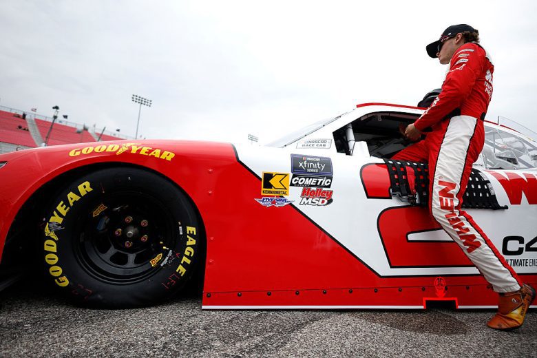 Jesse Love enters his car car Gateway.